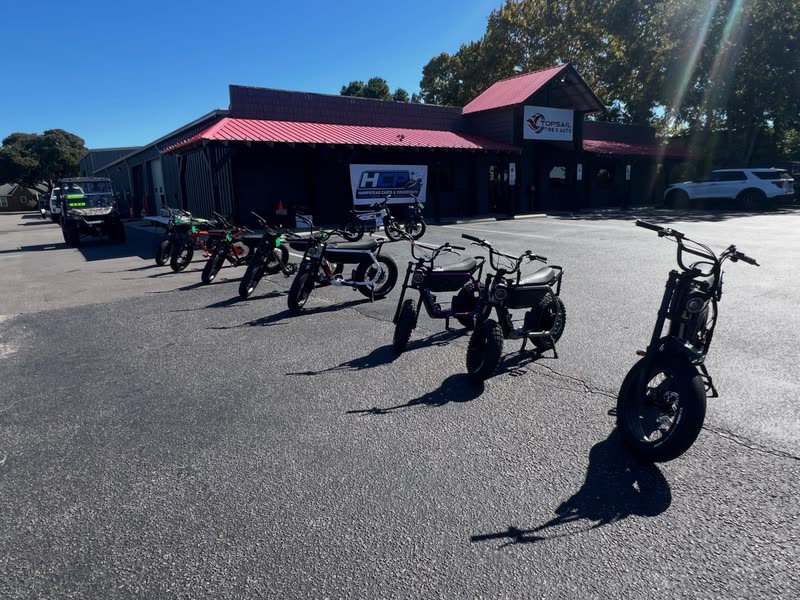 Super73 e-bikes lined up outside on a sunny Saturday