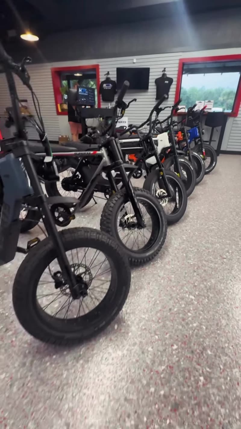 Row of Super73 e-bikes along the showroom wall